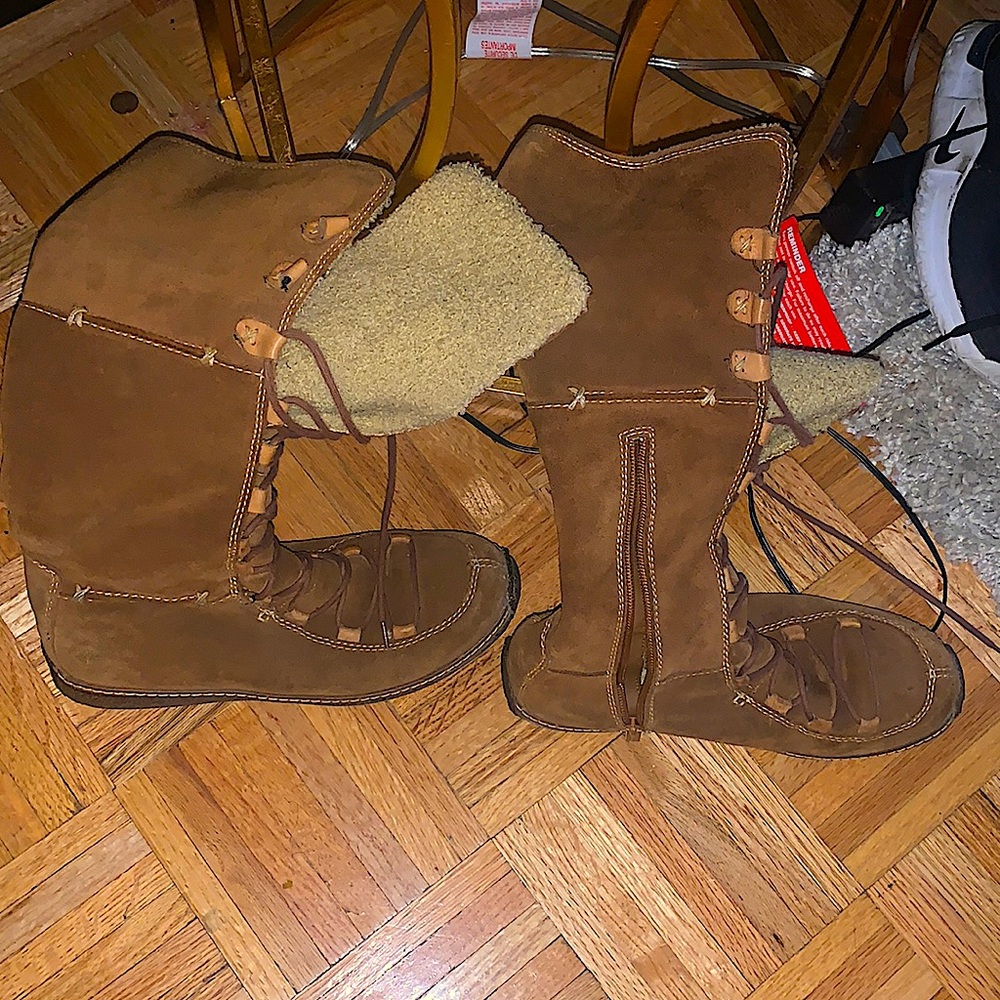 Tan suede knee high  Timberland boots.
